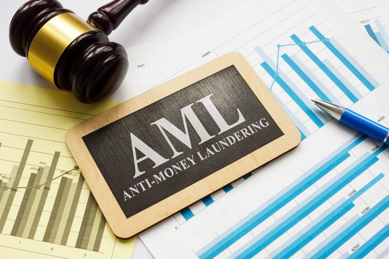 AML anti-money laundering plate and gavel with papers. sar investigations and aml