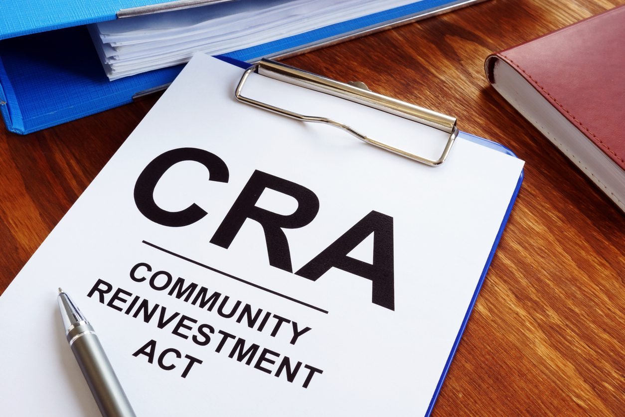Community Reinvestment Act CRA in the blue clipboard. community reinvestment act