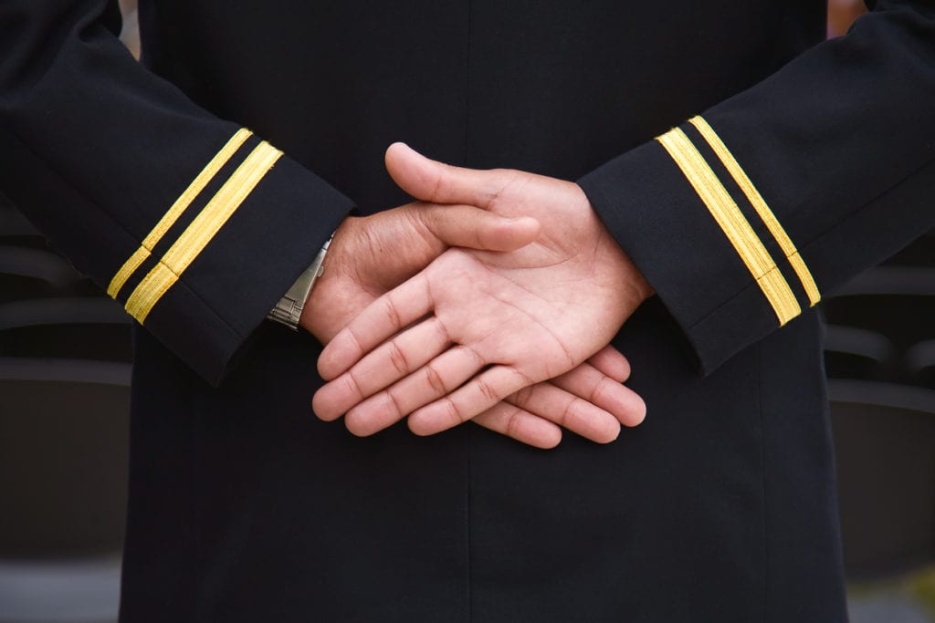 naval recruit hands folded